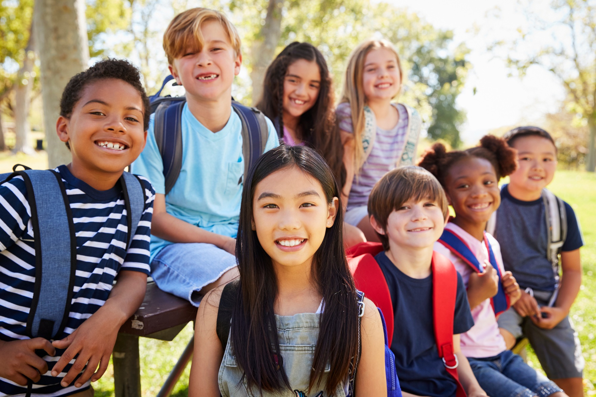 Multi-ethnic group of schoolchildren on a school trip