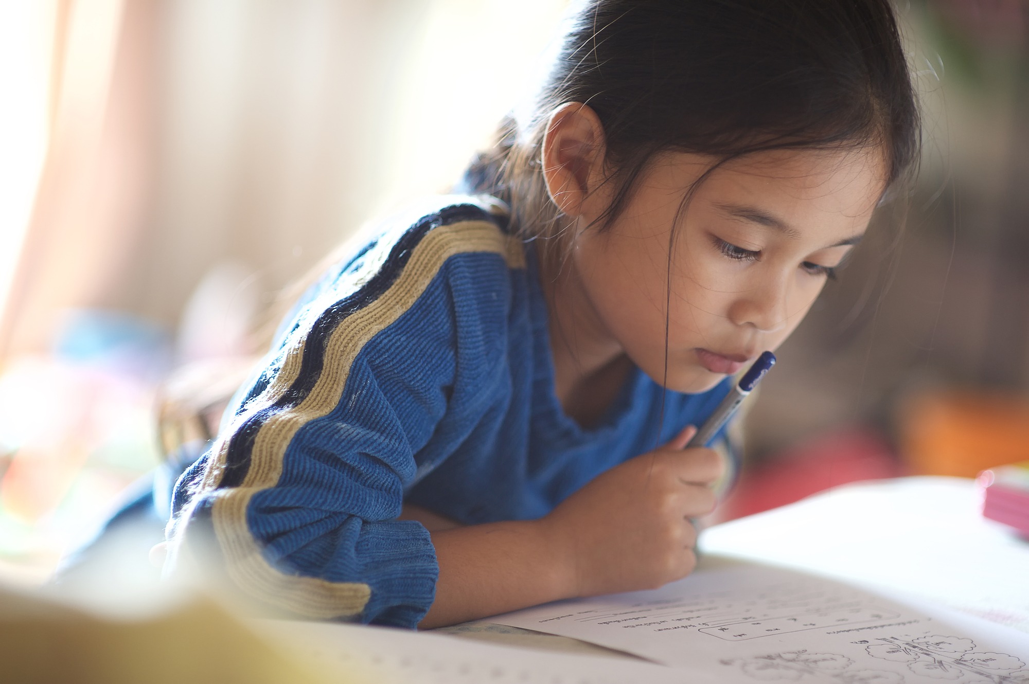 Asian young girl read a book