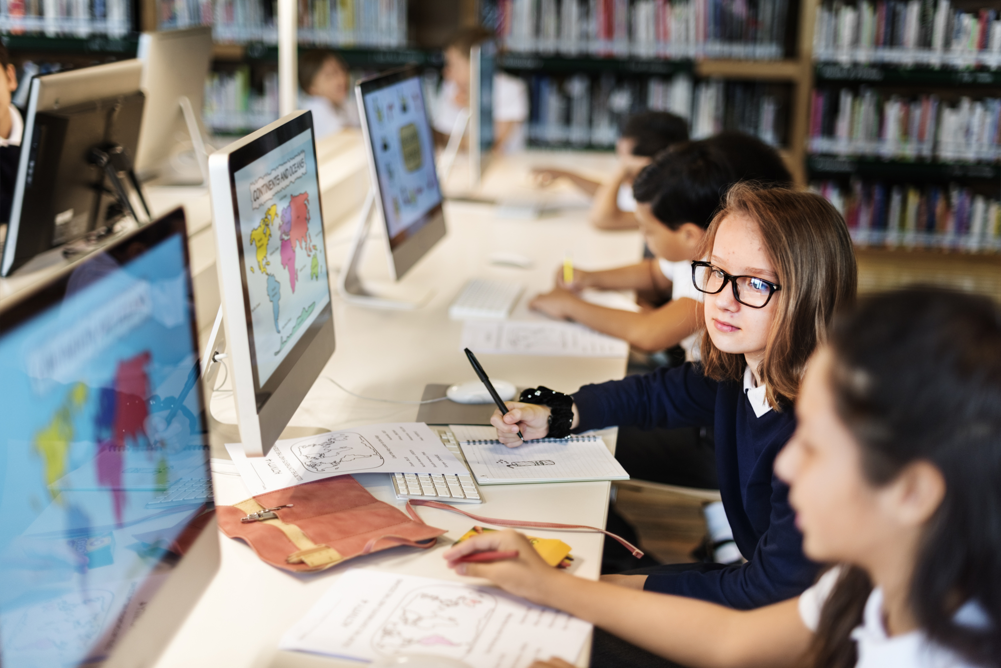 Education school students studying in a library